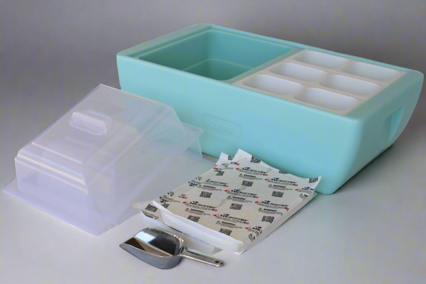 Light blue food chafer with clear lid, empty compartments, and accessory packet