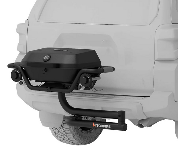 Rear-mounted black grill on white vehicle