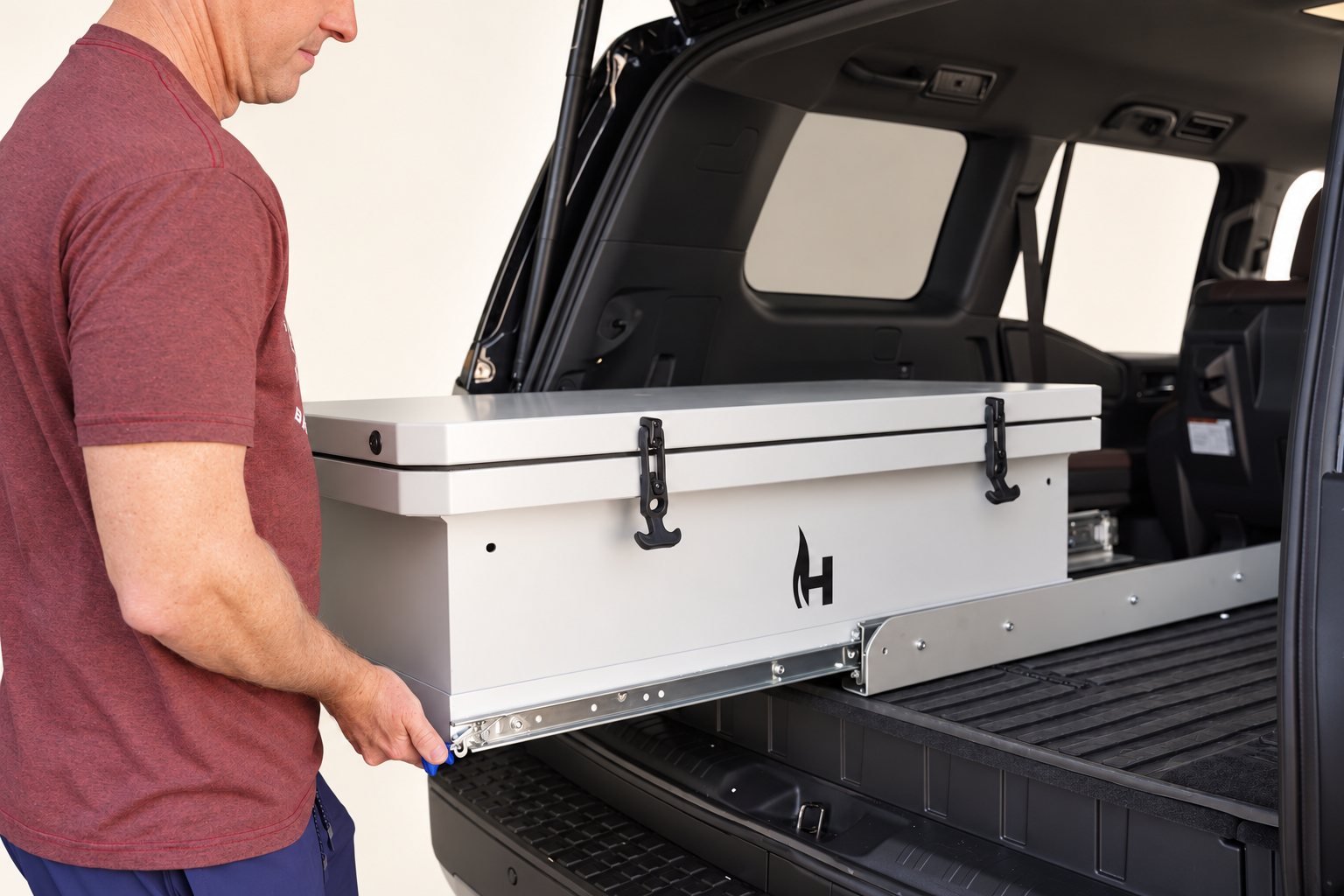 Camp Kitchen Slideout gliding out of the cargo area on its rails