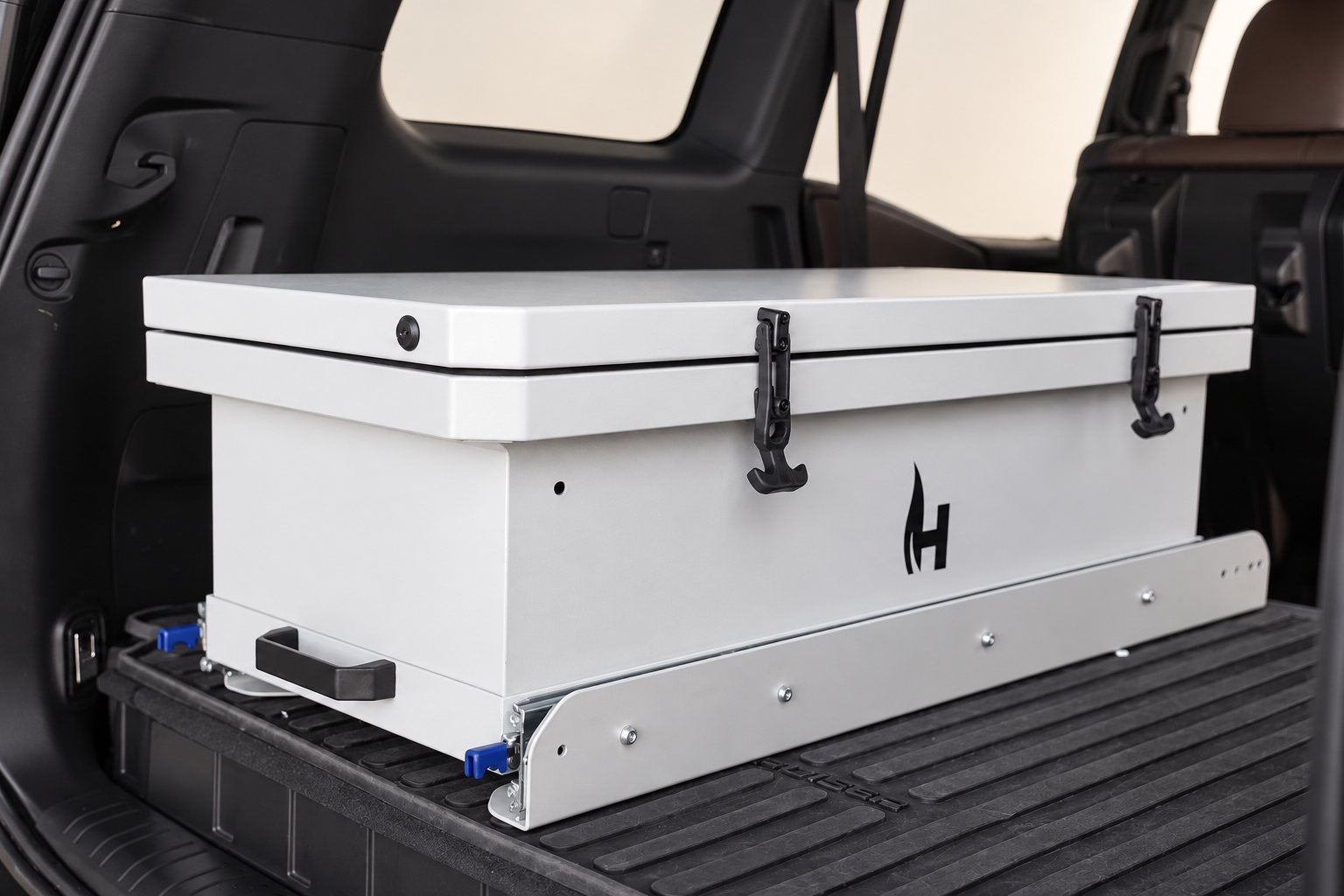 Camp Kitchen Slideout latched closed in an SUV cargo area