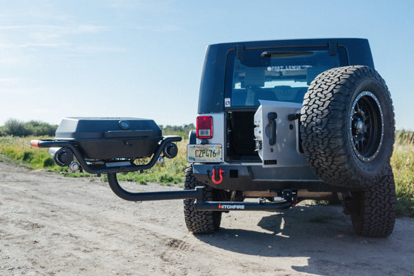 Forge 15 open swing arm on jeep