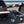 Load image into Gallery viewer, Open grill and side table near ocean