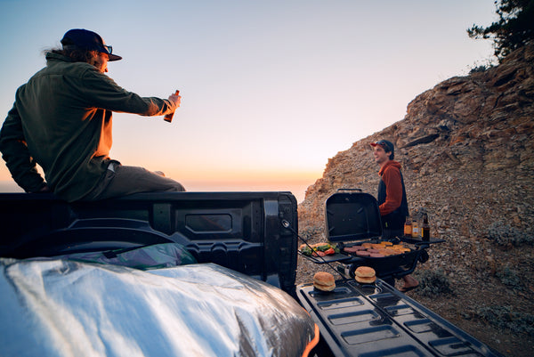 Sunset grilling truck tailgate grilling burgers