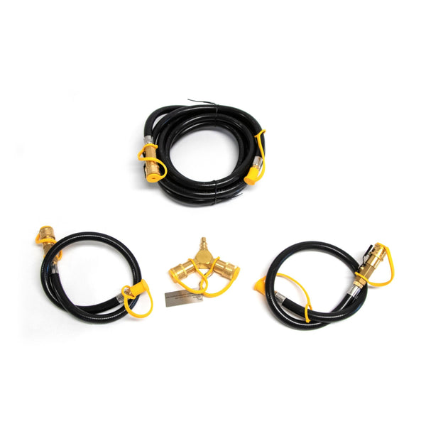 Quick connect kit with three coiled hoses, yellow caps, and central brass manifold