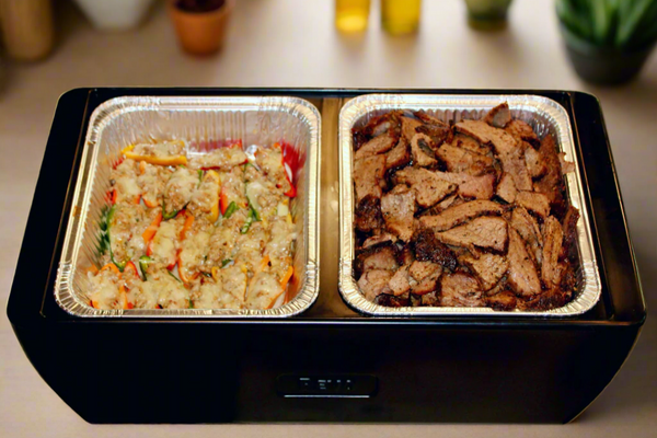 Deep black flameless chafer filled with two food trays for hot buffet serving
