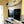 Load image into Gallery viewer, Minimalist Surfboard Display Rack | Holds 30 lbs
