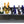 Load image into Gallery viewer, Deep black cooler with champagne and beer bottles on ice in two divided sections
