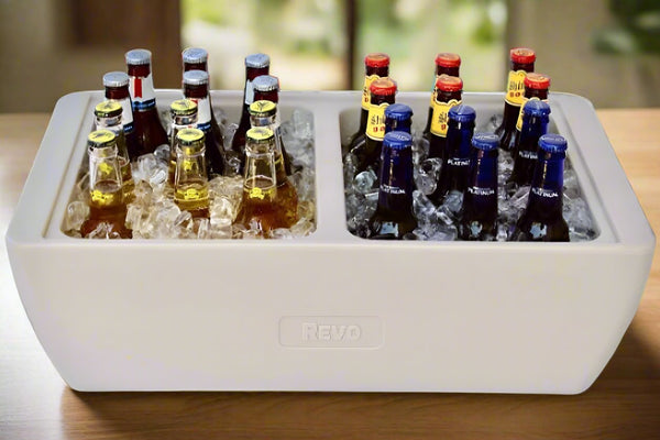 Light beige party cooler filled with assorted bottled drinks
