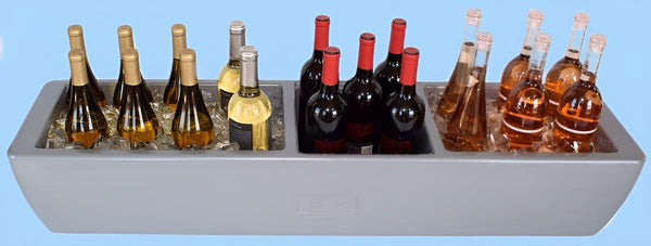 Metallic gray party bar cooler filled with wine bottles on ice
