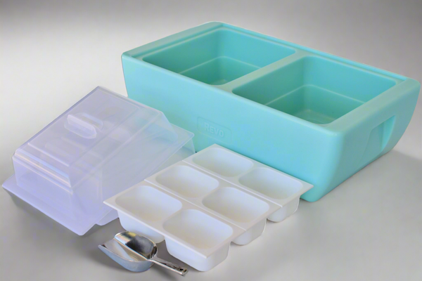 Turquoise party cooler with removable ice trays, clear lid, and small ice scoop