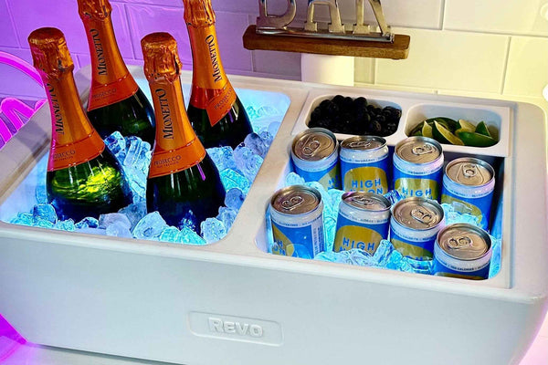 LED light-up ice cubes in a cooler, clear cubes glowing blue