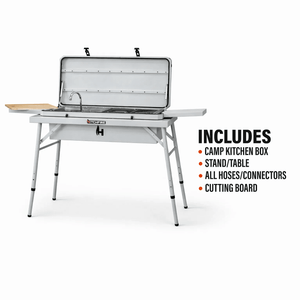 Camp kitchen grill with open lid and cooktop grates on folding legs
