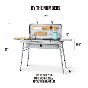 Camp Kitchen outdoor grill with prep boards, sink, and folding side shelves