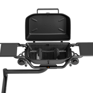 Black propane grill on a hitch mount, lid open with front vents and control knobs