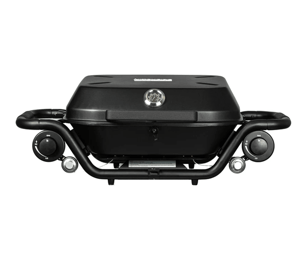 Tabletop propane grill with front hood, side control knobs, and ignition dial