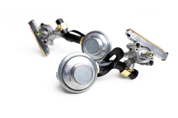 Forge 15 upgrade kit parts: silver valves with black hoses and mounting brackets