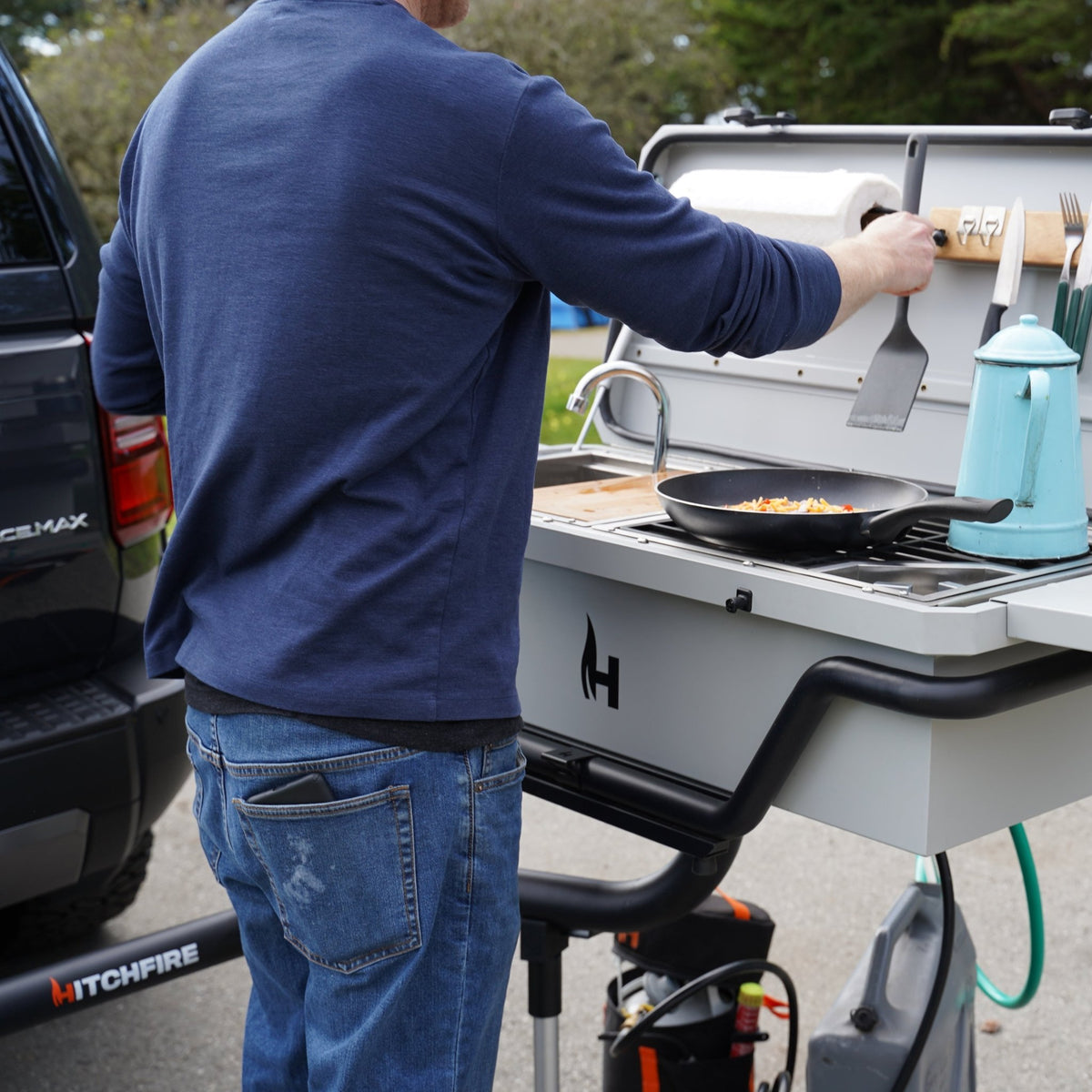 Hitch Kitchen in use, cook preparing food