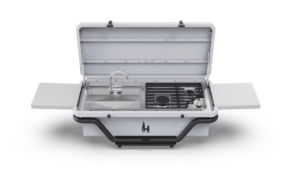 Camp kitchen chassis kit open view with storage compartment and cooktop area