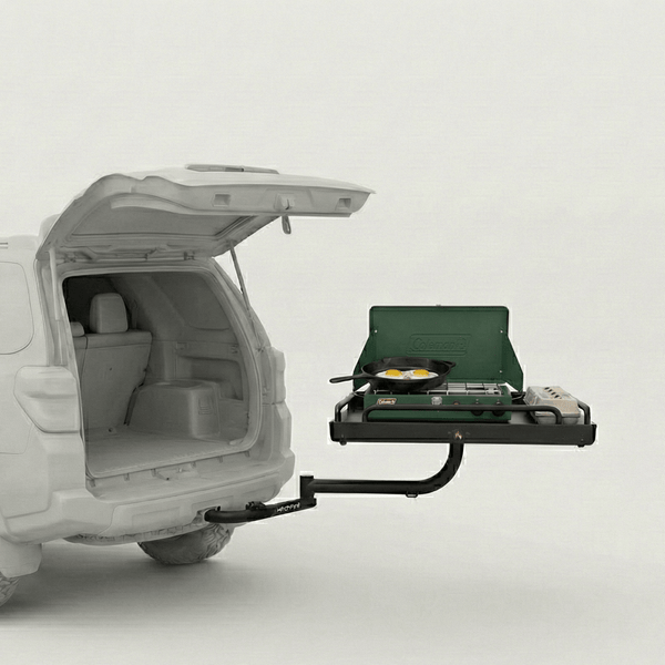 Rear cargo platform holding a green cooler on hitch-mounted swing arms