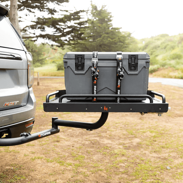 Black rear cargo platform with two lockable storage cases and strap loops