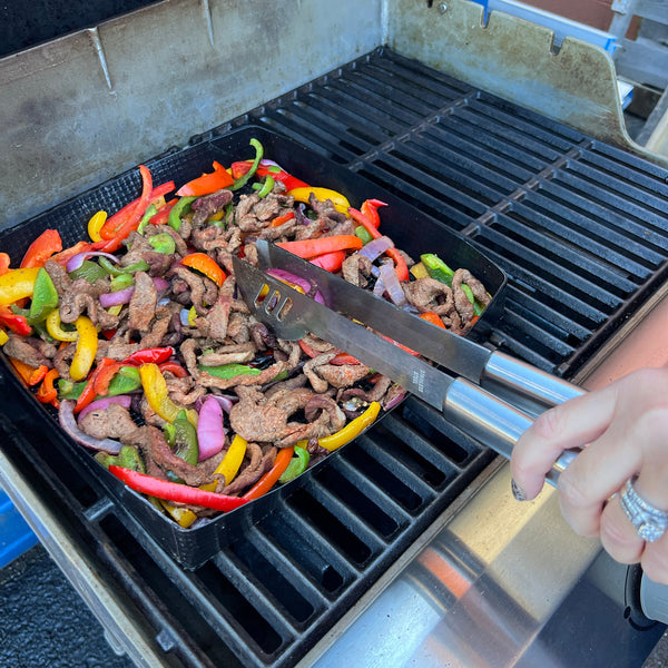 12 in x 12 in black nonstick mesh grill basket with grilled meat and peppers