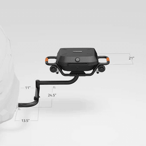 Hitch-mounted propane grill with dual swing arm and control knobs