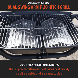 Hitch-mounted propane grill cooking grates with glossy black lid edge