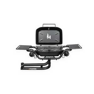 Hitch-mounted propane grill with open lid and two side work surfaces