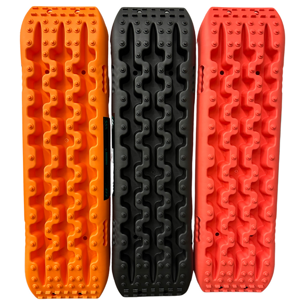 Off-road tire recovery boards set with orange, black, and red tread surfaces