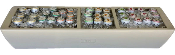 Greige mist party barge cooler with top bins holding cans and ice.