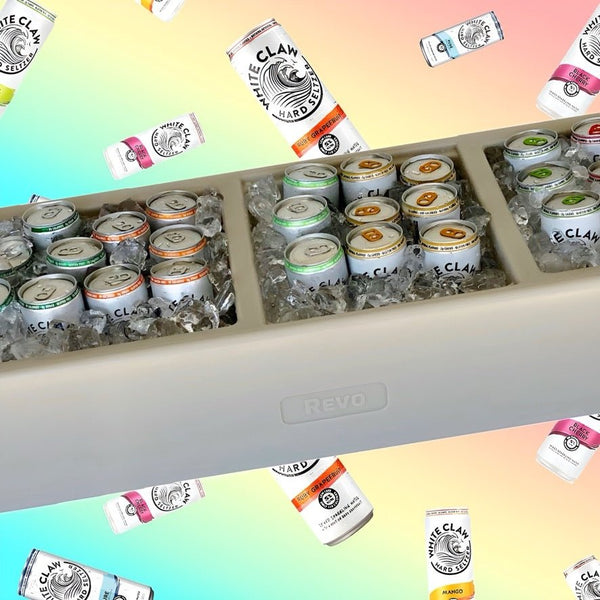 Greige mist party barge cooler with cans packed in ice.