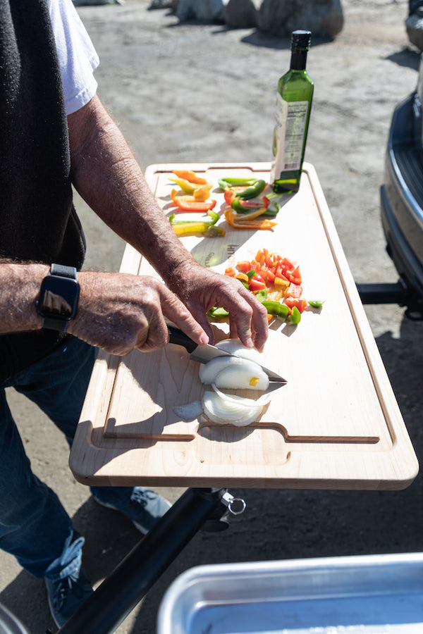 Cutting veggies on cutting board