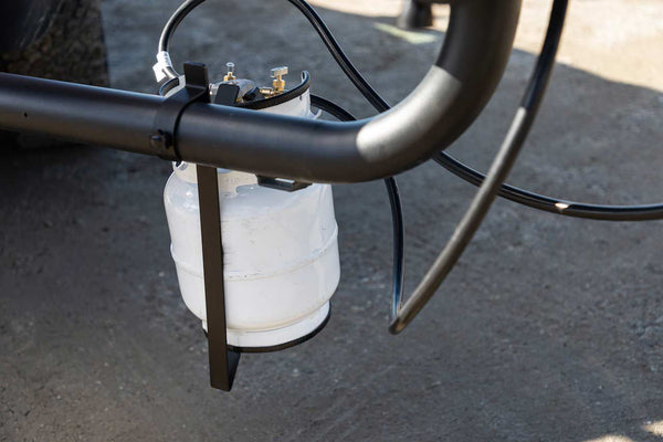 Propane tank mounted to swing arm