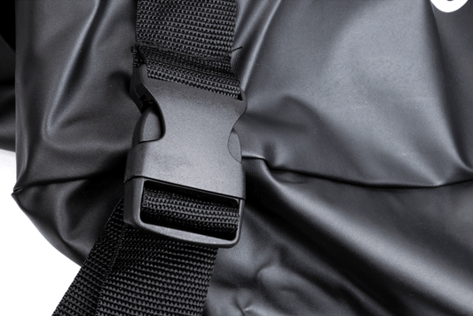Black grill cover securing strap with buckle and woven webbing