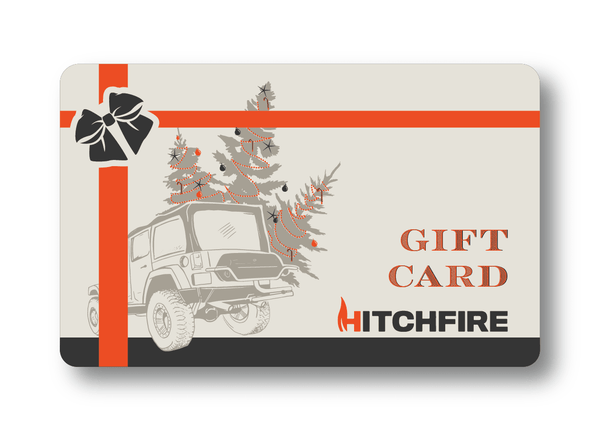 HitchFire gift card with orange ribbon, 'GIFT CARD' text, truck and fire graphics