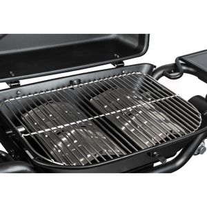 Open black propane grill with chrome cooking grates inside