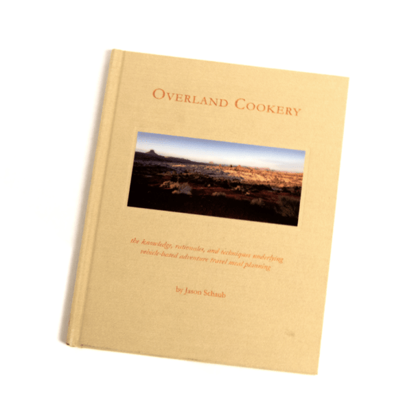 Overland Cookery cookbook, tan cover with title text and landscape photo