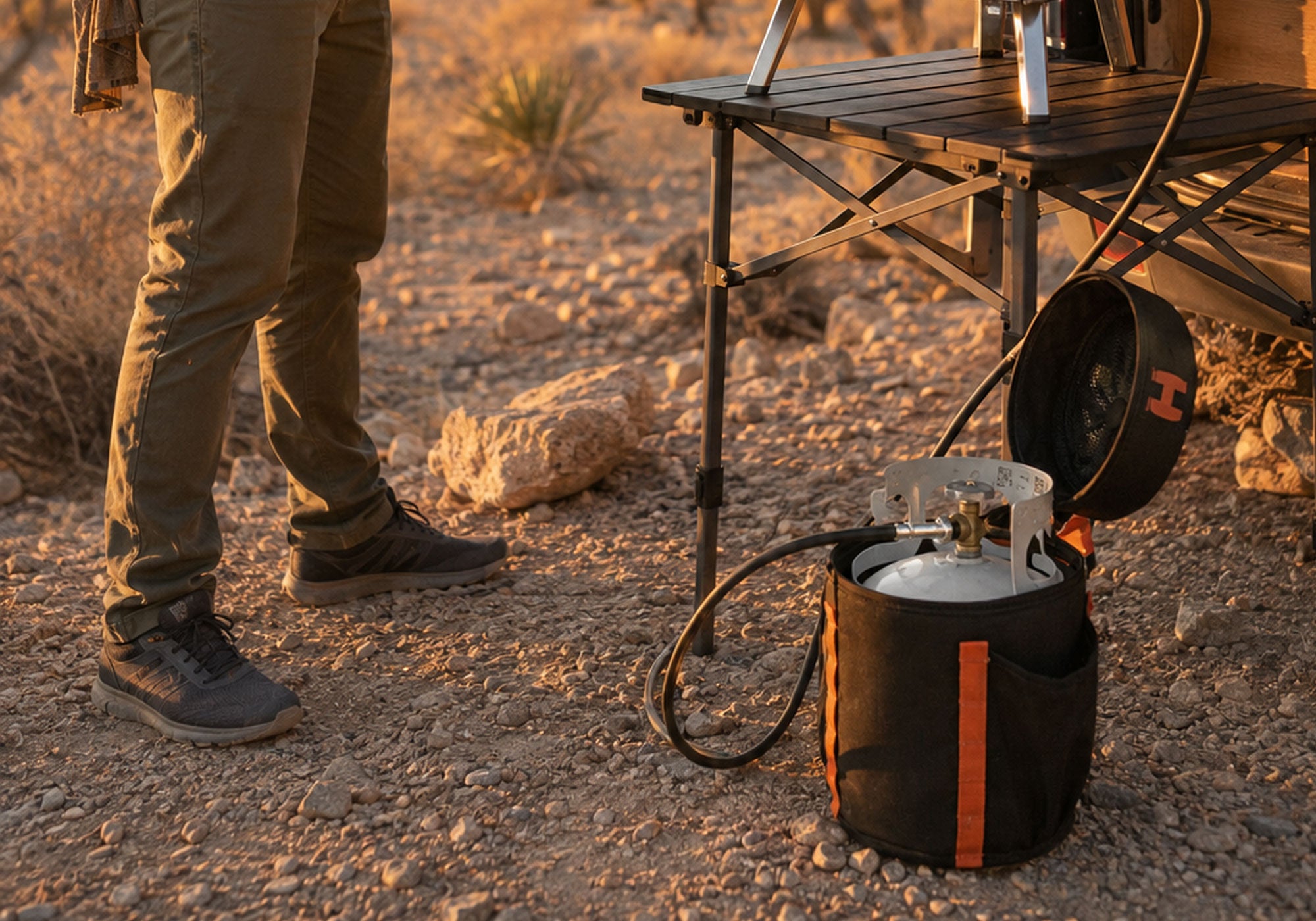 HitchFire refillable 5lb propane growler in use at camp