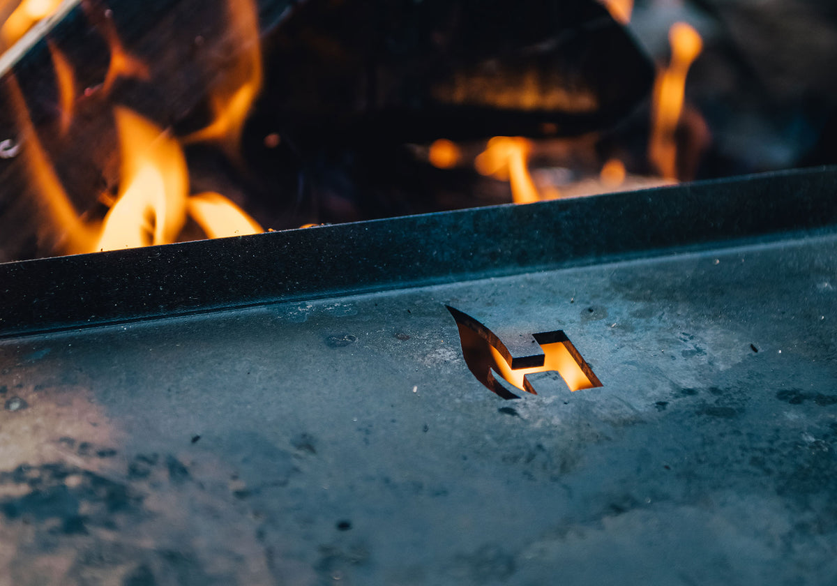 HitchFire cast iron flat top griddle on the grill